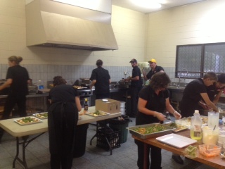 On The Menu Catering Darwin - The Team Packing Food